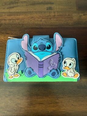 Loungefly Disney Lilo and Stitch Story Time Duckies Flap Wallet.